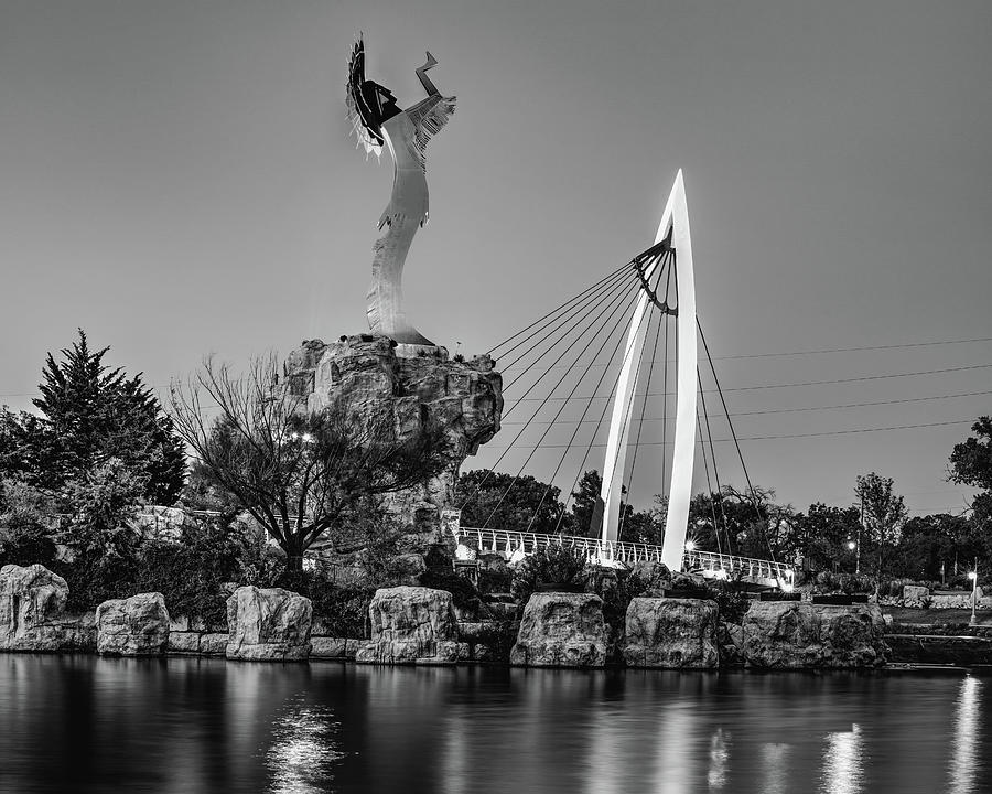 Wichita Keeper Of The Plains And Bridge Over The Arkansas River In Monochrome Photograph by Gregory Ballos