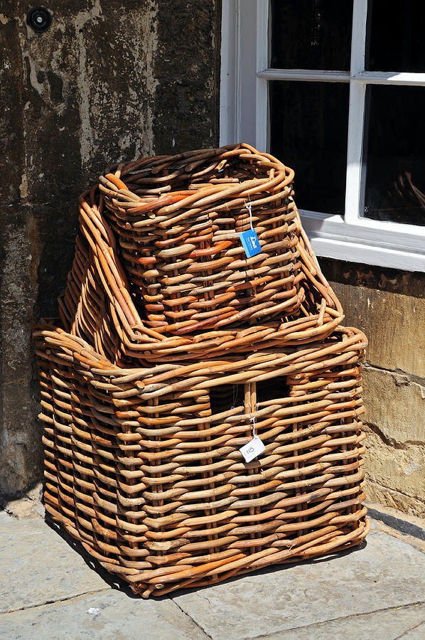 Wicker baskets for sale, Broadway. Photograph by CaronB