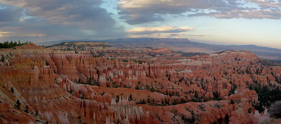 Wide panorama of Bryce Canyon at twilight in spring. Photograph by Jean-Luc Farges