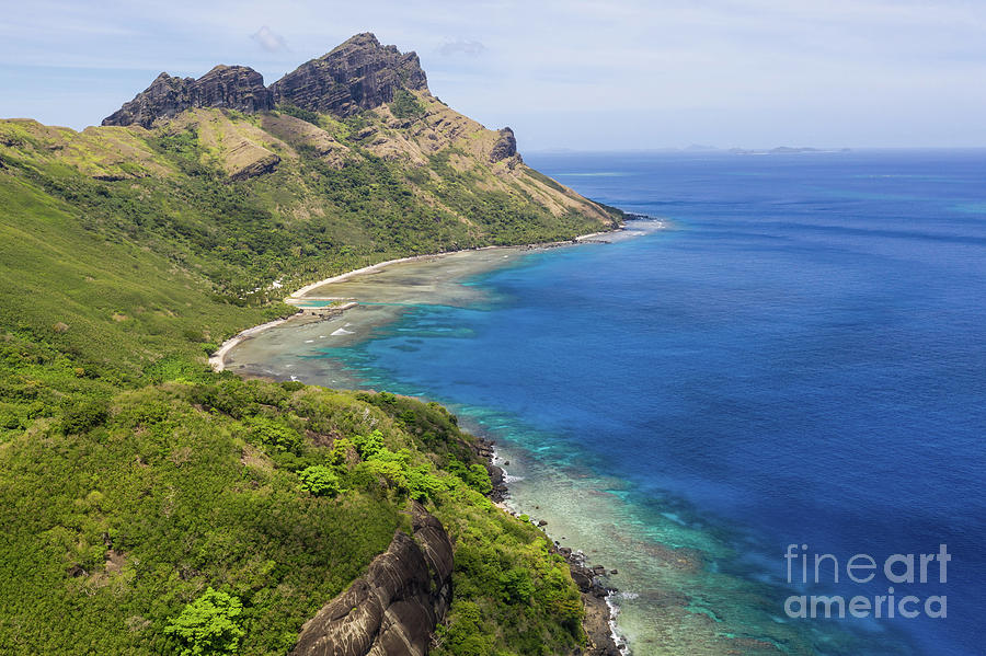 Wild coast of the tropical Waya island in the Yasawa islands gro Photograph by Didier Marti