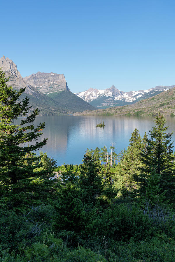 Wild Goose Island in Glacier National Park, on a sunny day with ...