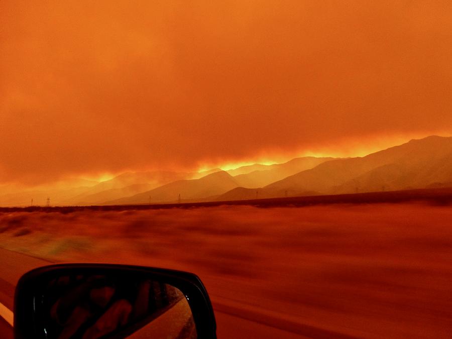 Wildfire Glow evacuating on Hwy395  Photograph by Amelia Racca