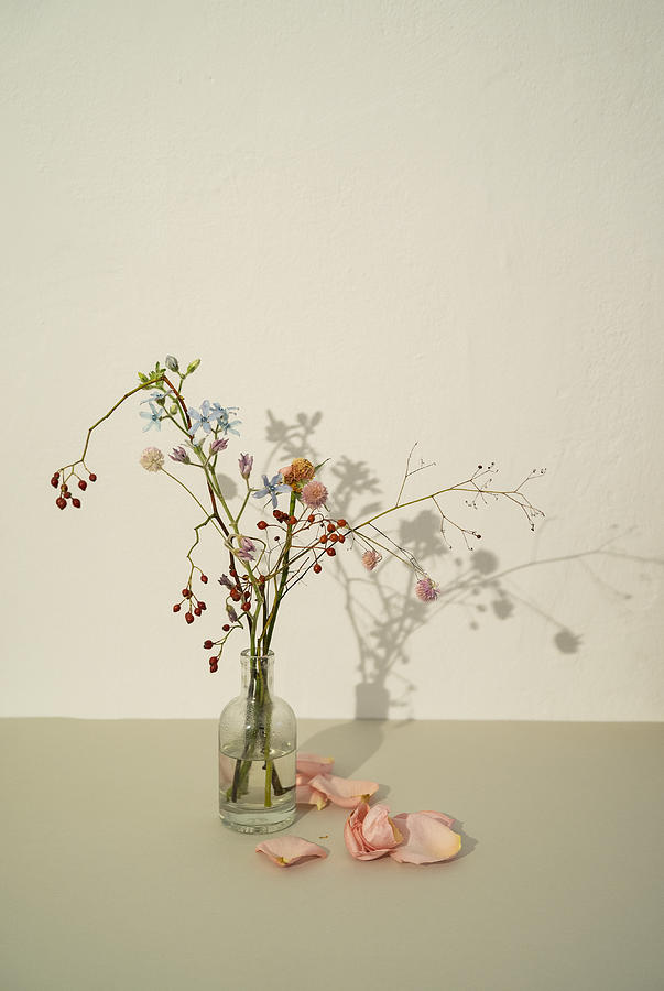 Wilting flower arrangement in vase Photograph by Benne Ochs