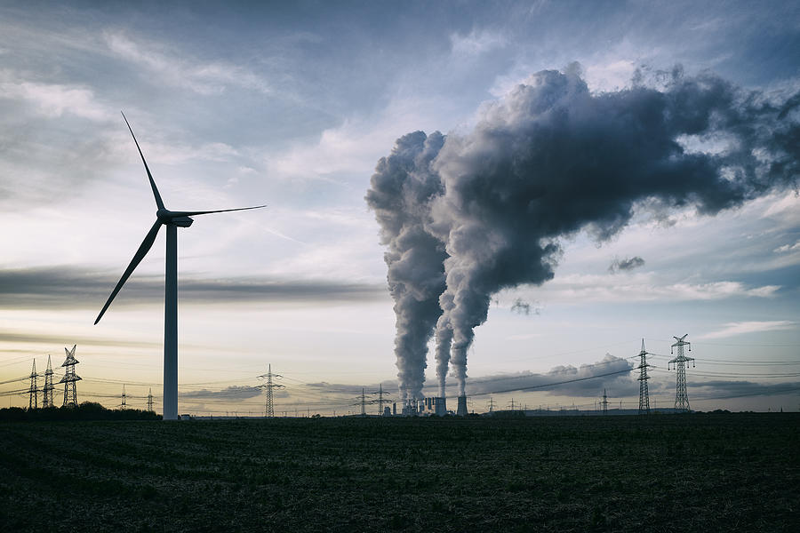 Wind energy versus coal fired power plant Photograph by Acilo