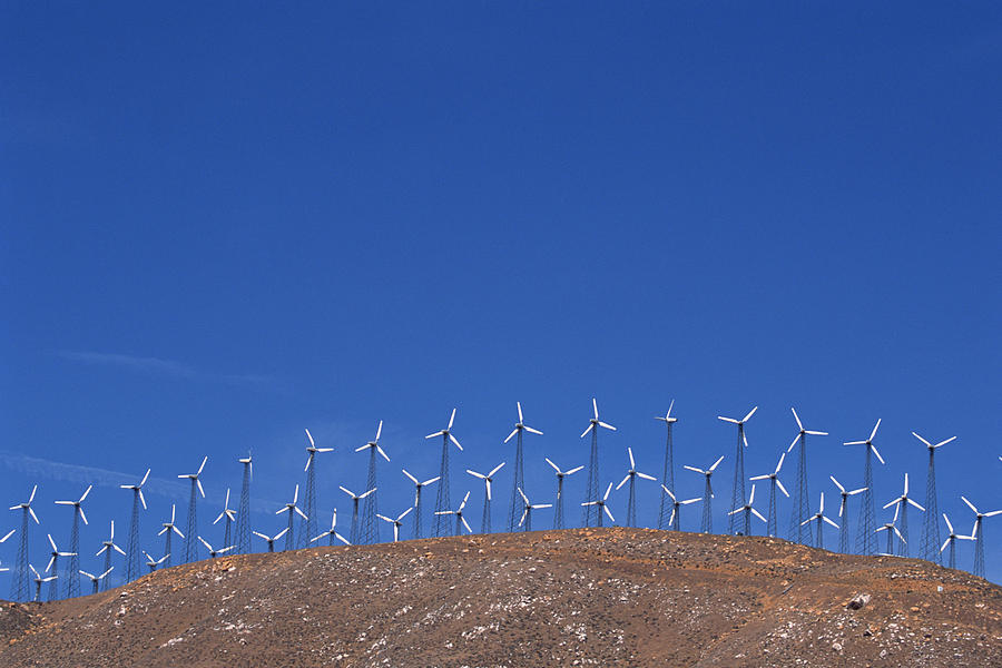 Wind farm on rural hillside Photograph by Comstock Images