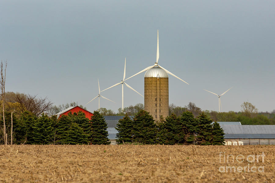 Wind Turbines and Farm Silo Photograph by Jim West