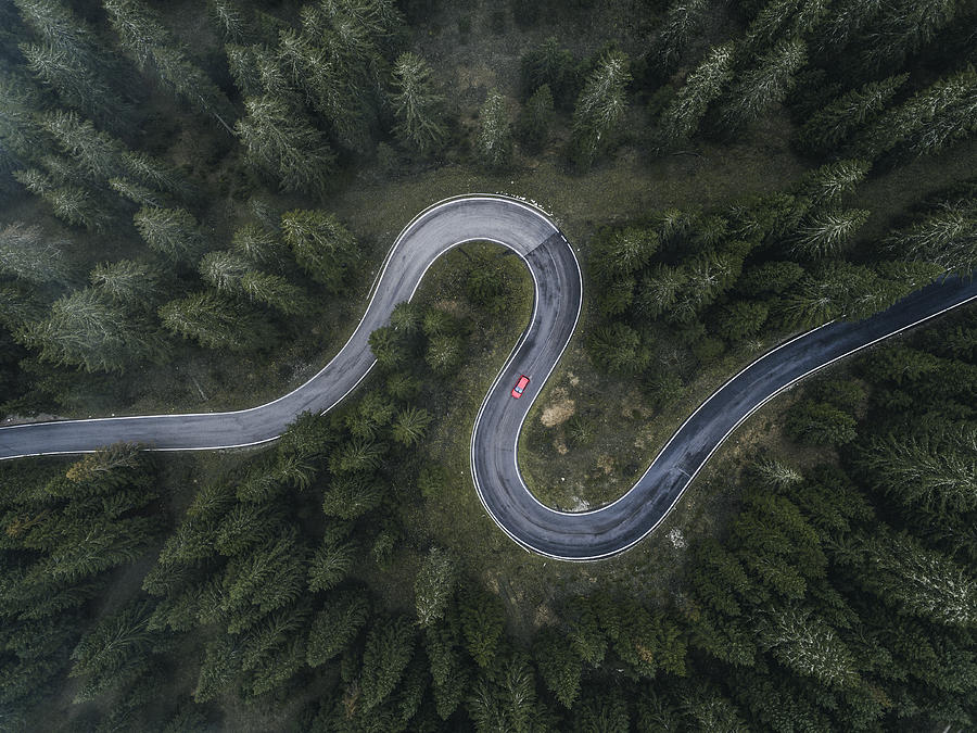 Winding forest road seen and a car shot by drone, Dolomites, Italy Photograph by Abstract Aerial Art Winding forest road seen and a car shot by drone, Dolomites, Italy Photograph by Abstract Aerial Art
