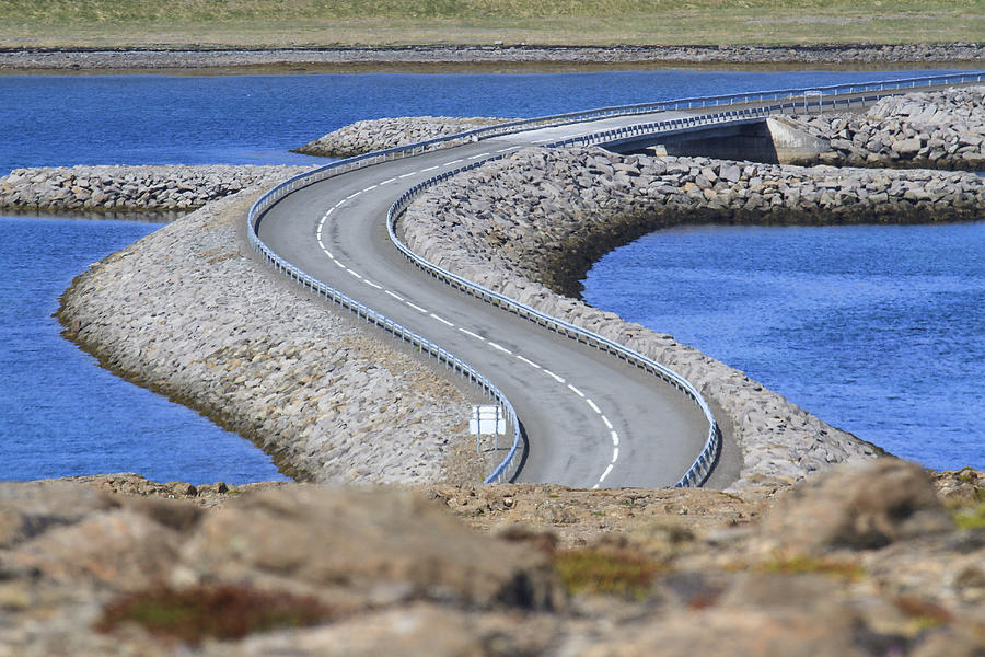 Winding road across river Photograph by [Hans Henning Wenk]