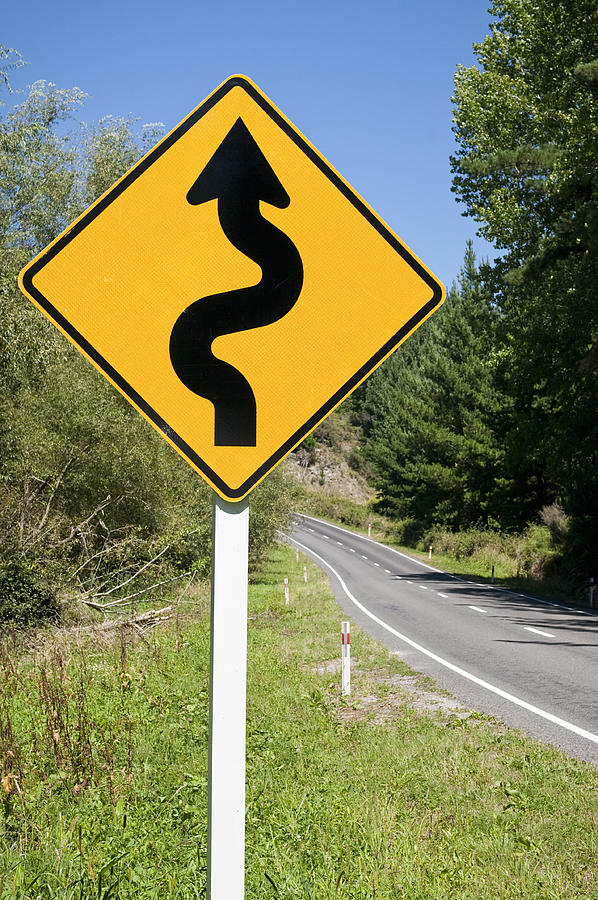 Winding Road Warning Sign Photograph by Georgeclerk