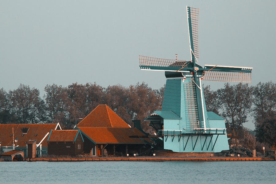 Windmill and houses. Traditional Dutch landscape in Zaanse Schans, Netherlands Photograph by Photo by Victor Ovies Arenas
