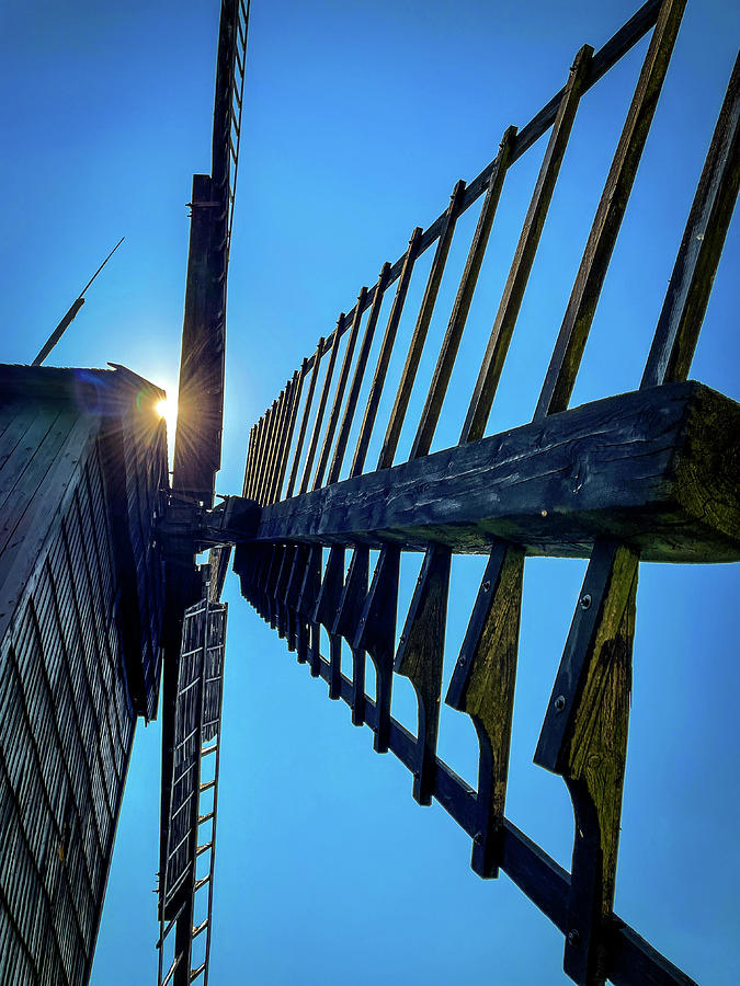 Windmill arms with the sun shining through Photograph by Wladyslaw ...