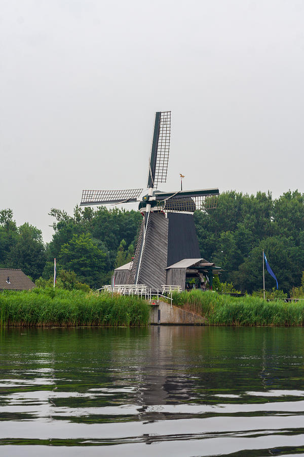 Windmill De Eenhoorn in Haarlem, the Netherlands Photograph by Flottmynd