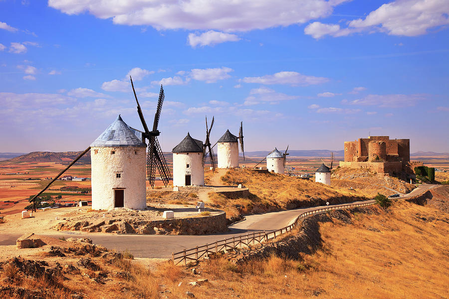 Windmills and castle of Consuegra. Spain Photograph by Stefano Orazzini