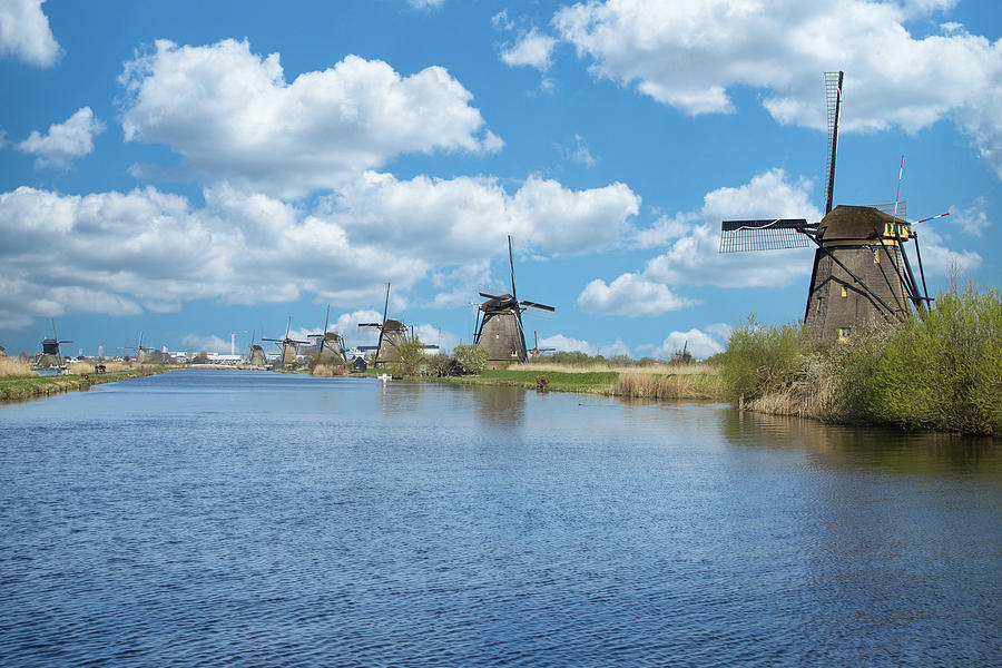Windmills at Kinderdijk Photograph by Pietro Ebner