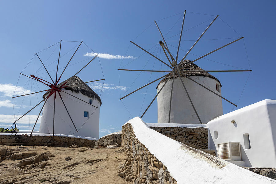 Windmills in Mykonos Photograph by Pietro Ebner