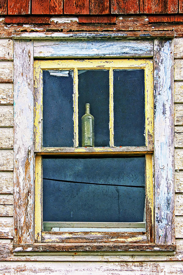 Window with a bottle Newfoundland Photograph by Tatiana Travelways