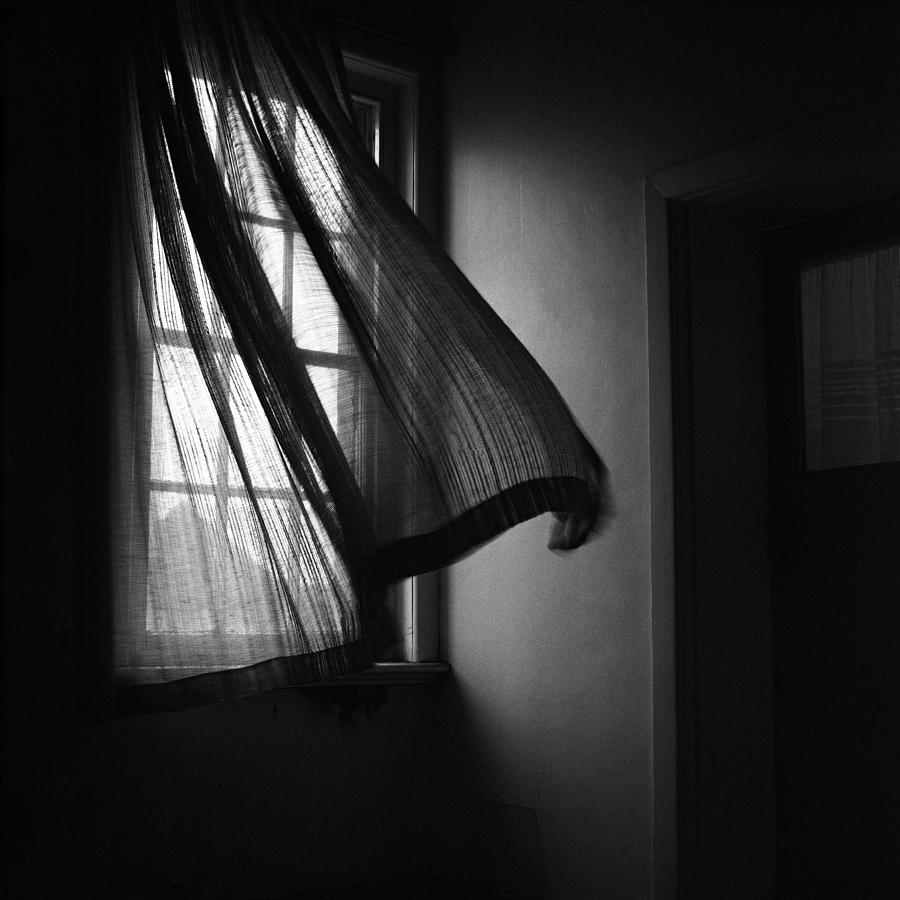 Window with curtain moving Photograph by © Roberts Birze