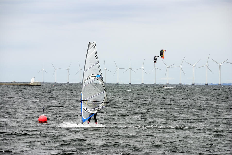 Windsurfing and Kiteboarding - wind turbines in the background Photograph by Monap