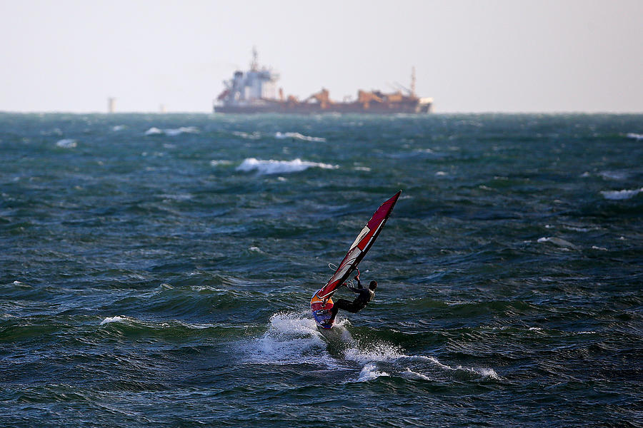 Windsurfing In Brighton Photograph by Dan Istitene