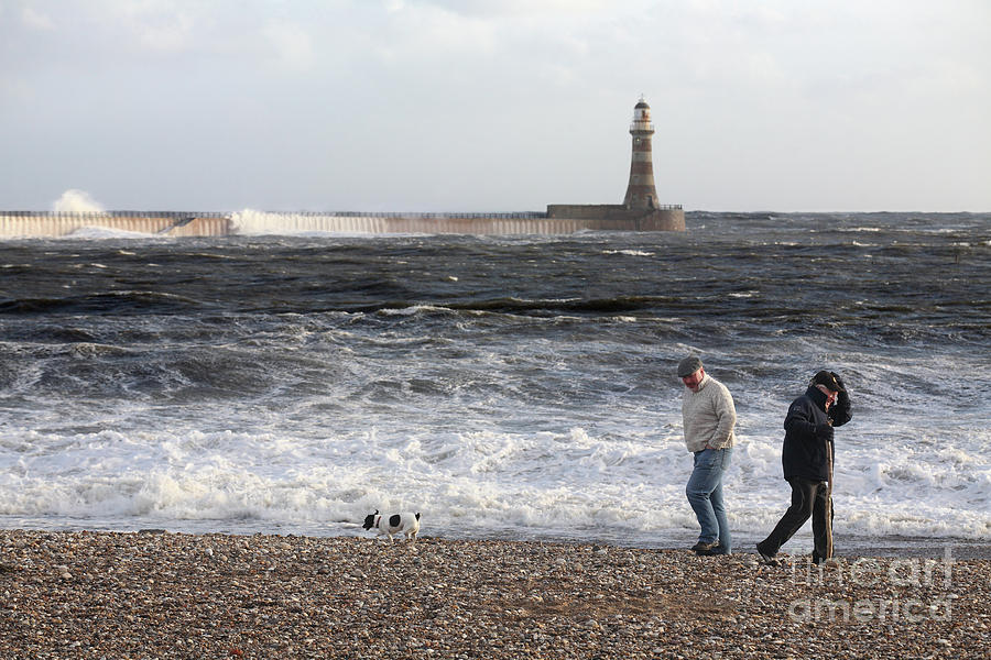 Windy day Roker Photograph by Bryan Attewell