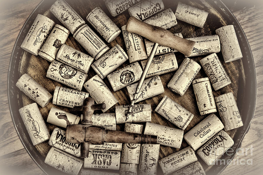 Wine Photograph - Wine Corks on a Wooden Barrel Artistic by Paul Ward