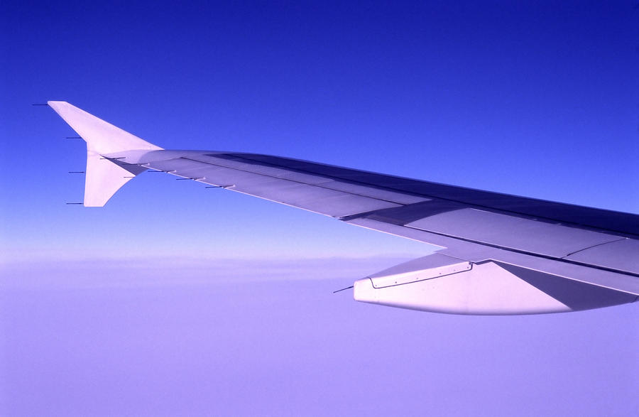 Wing of an airplane Photograph by Sergeo_Syd