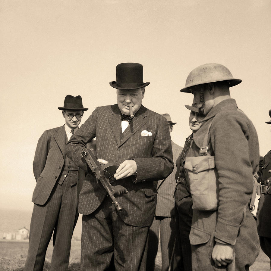 Winston Churchill Painting - Winston Churchill inspects a Tommy gun during an inspection of invasion defenses near Hartlepool by English School
