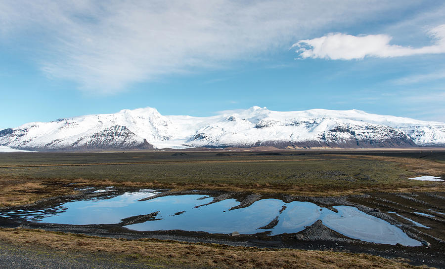 Winter Icelandic landscape with lake and mountains. Iceland Photograph by Michalakis Ppalis