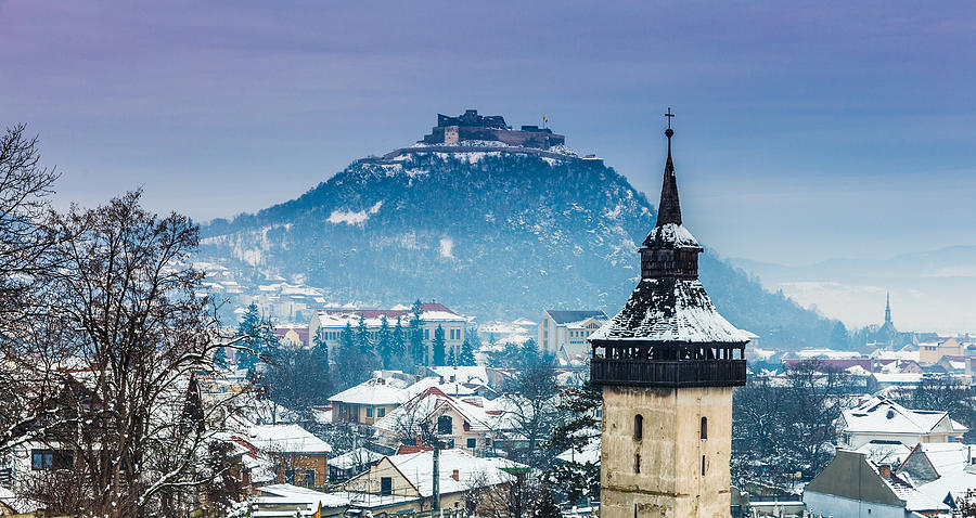 Winter landscape and church spire in Transylvania, Romania Photograph by Coldsnowstorm