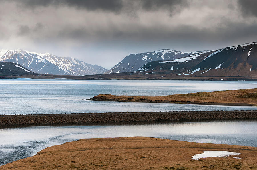 Winter mountain landscape and frozen lake Iceland Photograph by Michalakis Ppalis