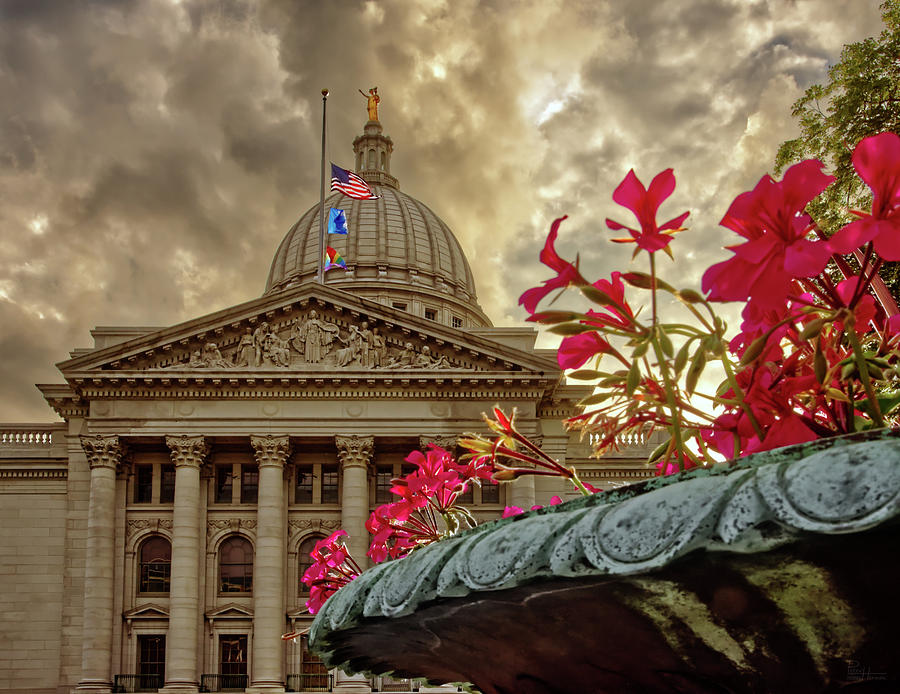 Wisconsin Capitol building with June flowers - flags at half mast for Covid deaths Photograph by Peter Herman