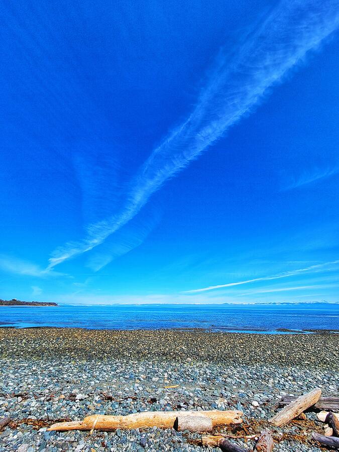 Pebbles Photograph - Wisping Clouds - Comox by Adam Copp