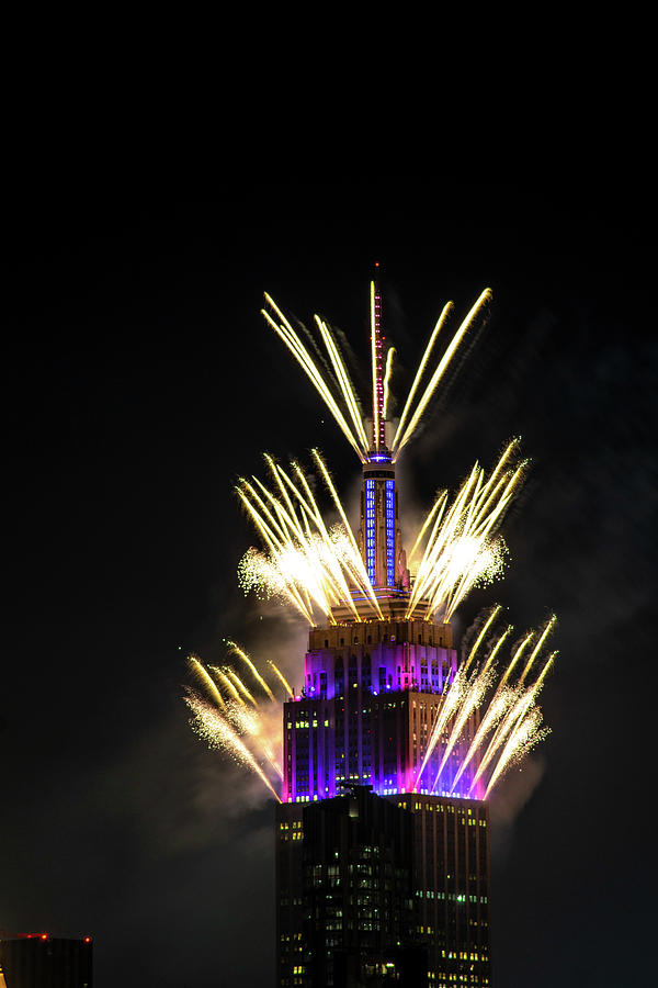 Withe Fireworks in Empire State Building Photograph by Fernando Magrane