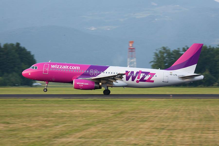 Wizz Air landing at Ljubljana Joze Pucnik Airport , Slovenia Photograph by Ian Middleton