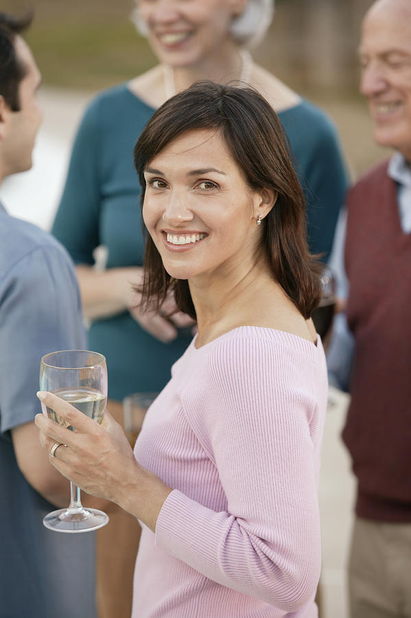 Woman at party Photograph by Comstock Images