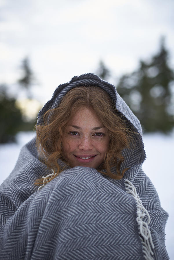 Woman Covered In Cashmere Blanket In Winter Photograph by Justin Case
