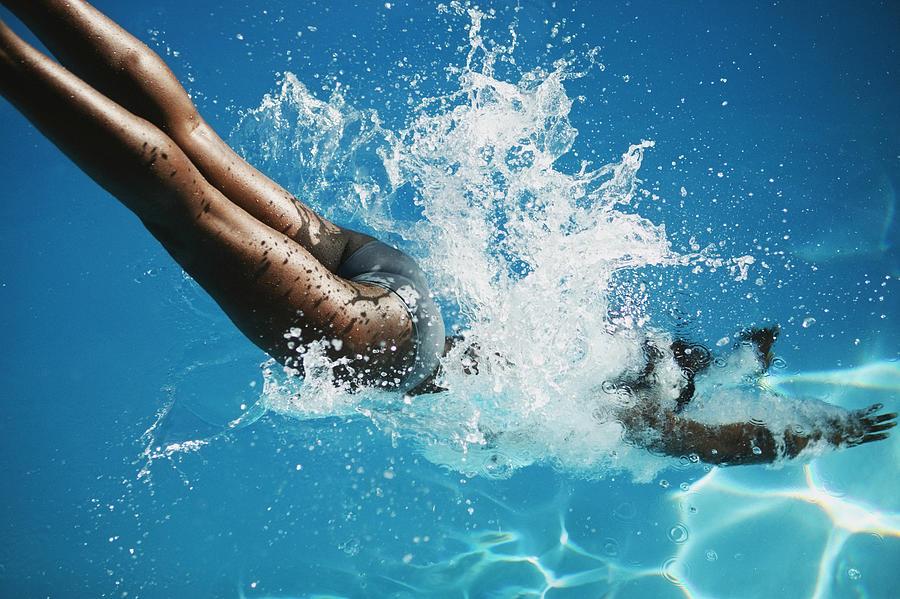 Woman Diving into Water Photograph by Dimitri Otis