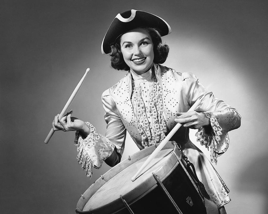 Woman dressed as drummer from American Revolution Photograph by Stockbyte