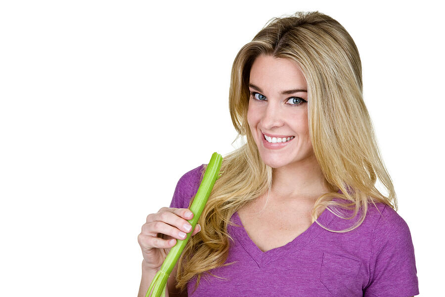 Woman eating healthy Photograph by Stockphoto4u
