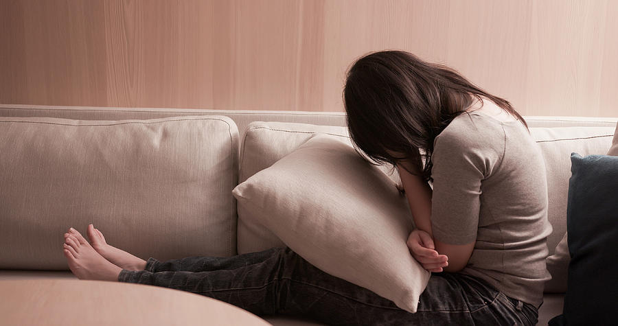 Woman Feel Depressed On Sofa Photograph by RyanKing999