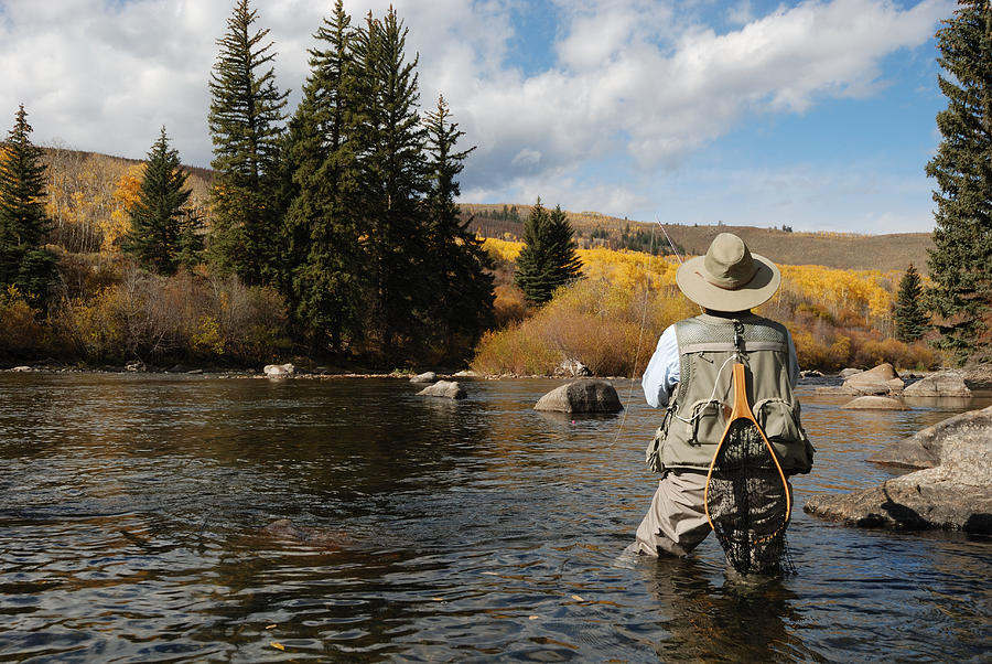 Woman Fly-Fishing Photograph by Skibreck