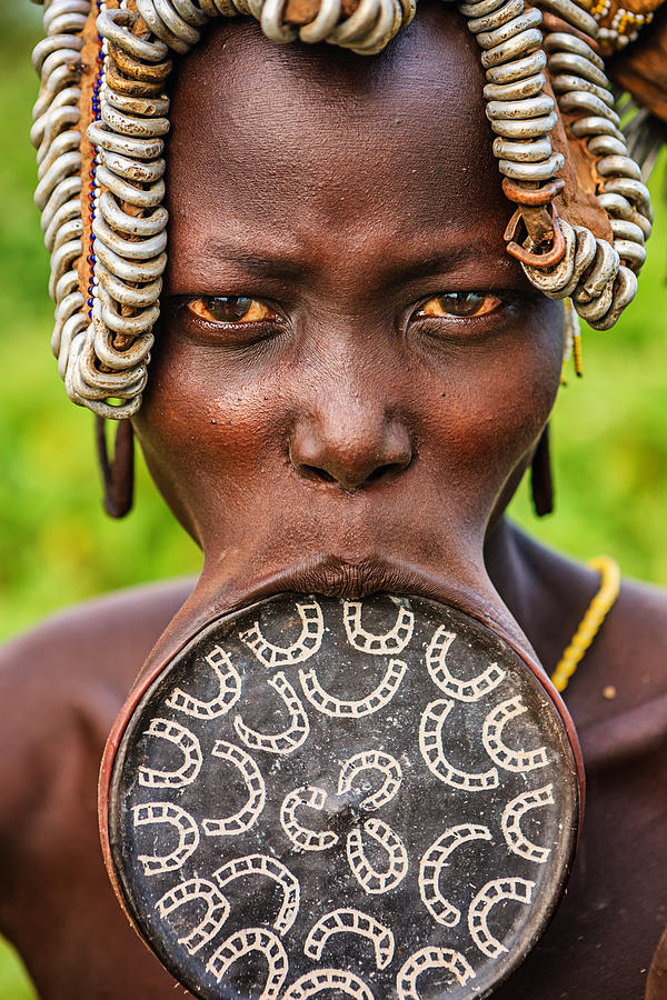 Woman from Mursi tribe with lip plate, Ethiopia, Africa Photograph by Bartosz Hadyniak