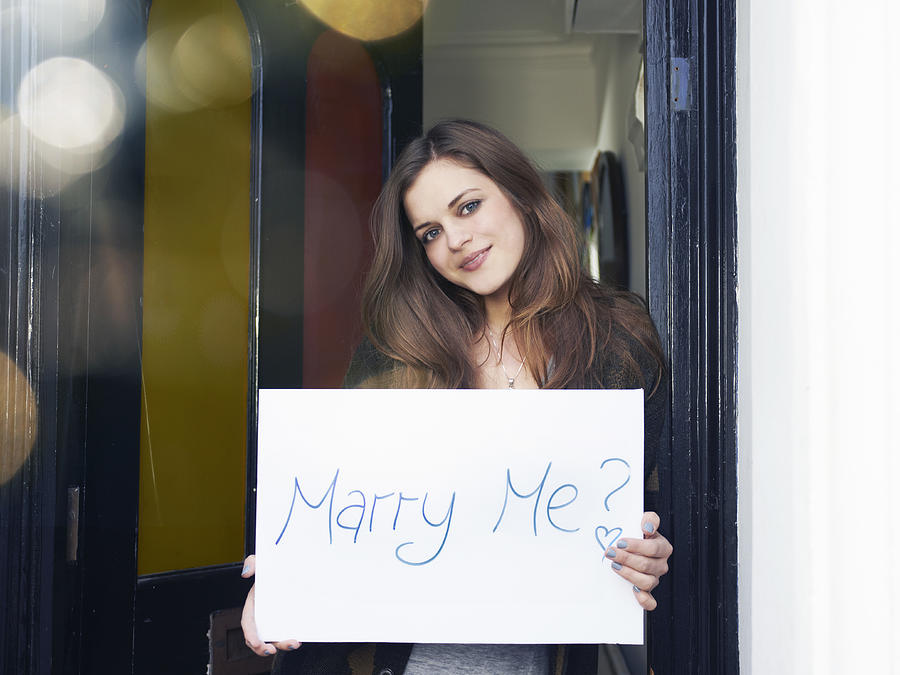 Woman Holding Sign Saying marry Me? Photograph by Tara Moore