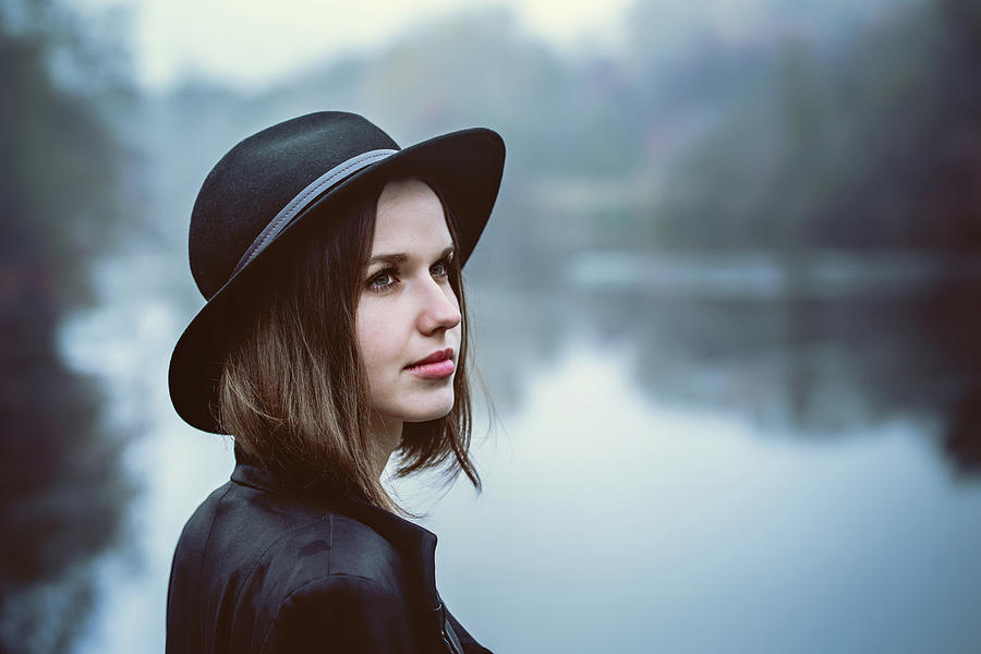 Woman in a black hat Photograph by Iuliia Malivanchuk