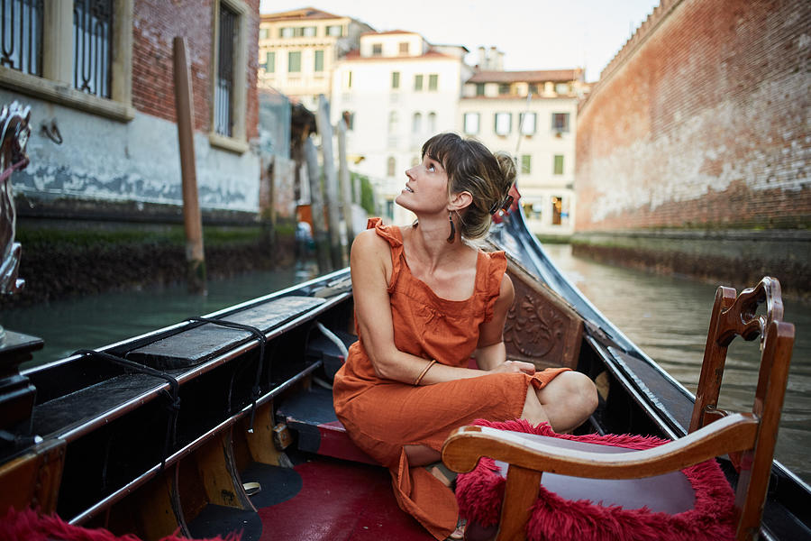 Woman in a gondola Photograph by Mathieu Young