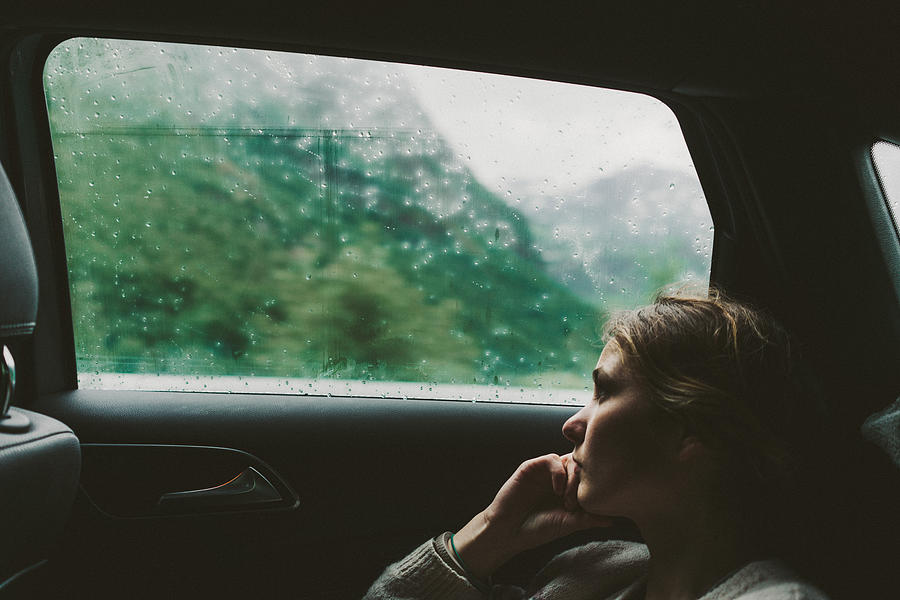 Woman in car Photograph by Oleh_Slobodeniuk