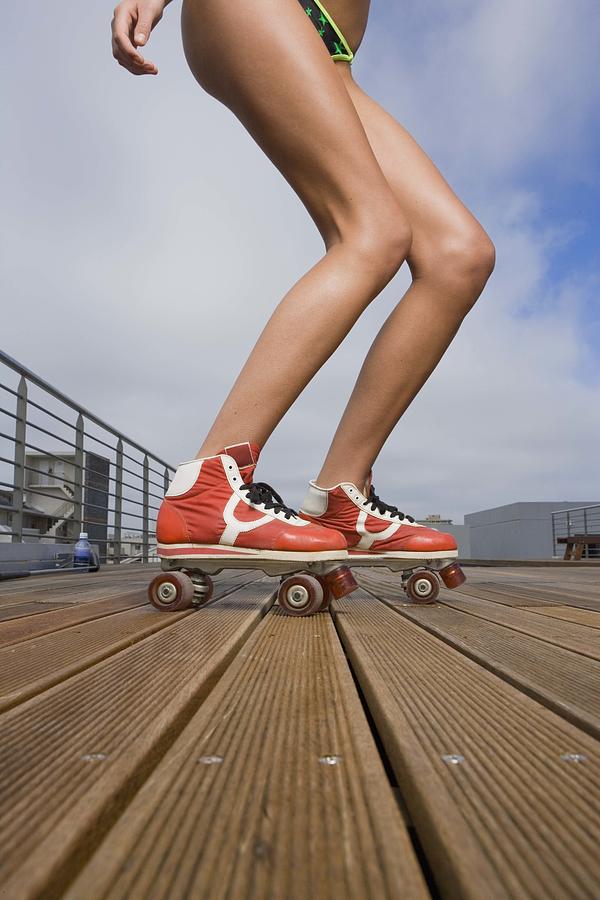 Woman in roller skates Photograph by Jupiterimages