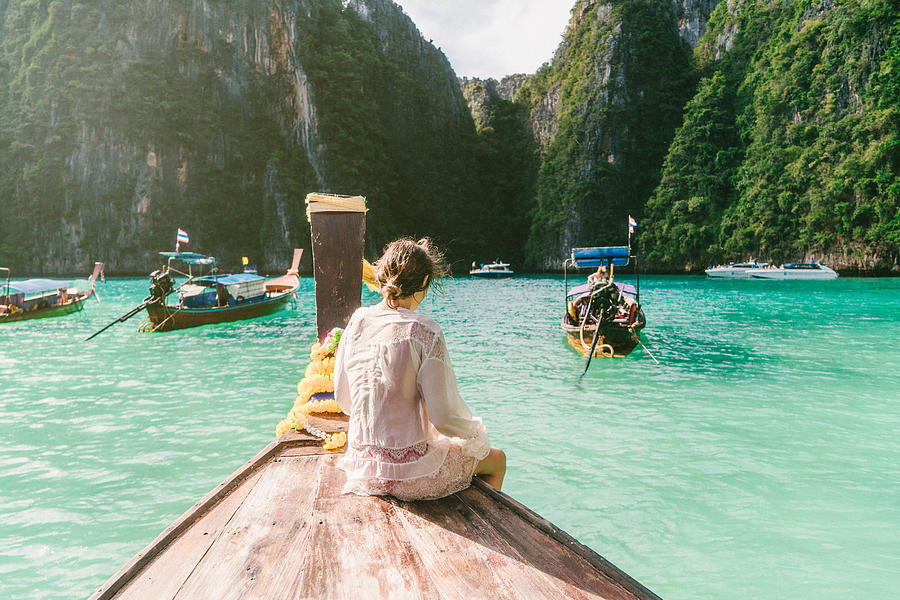Woman in Thai Taxi Boat Photograph by Oleh_Slobodeniuk