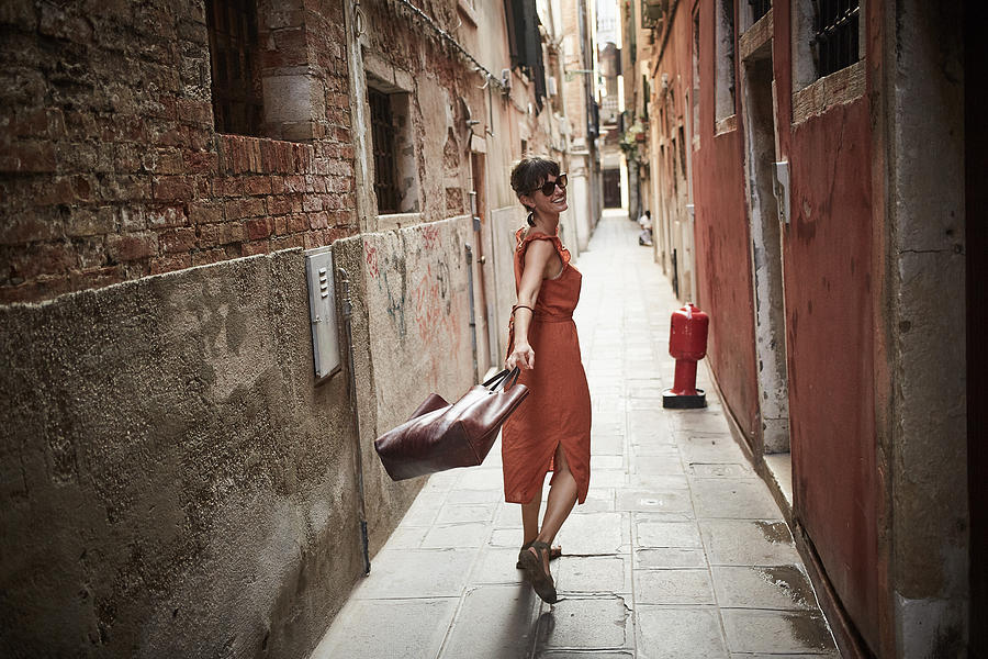 Woman in Venice Photograph by Mathieu Young