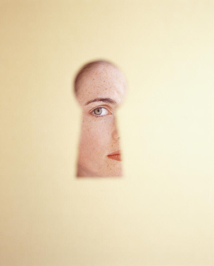 Woman looking through keyhole, (Portrait) Photograph by Barbara Penoyar